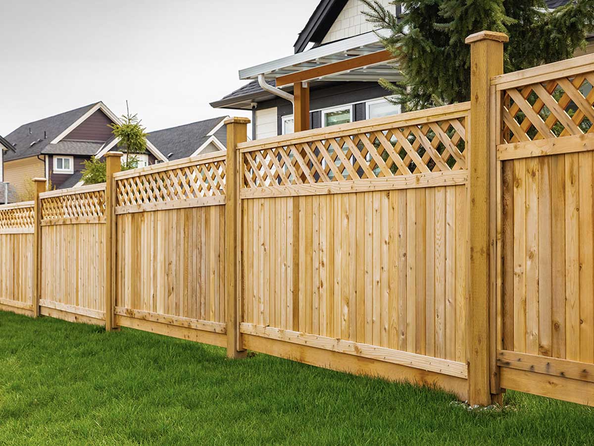 Cedar Privacy Fence with Decorative Lattice Top - Elegant Residential Border in Walton, KY